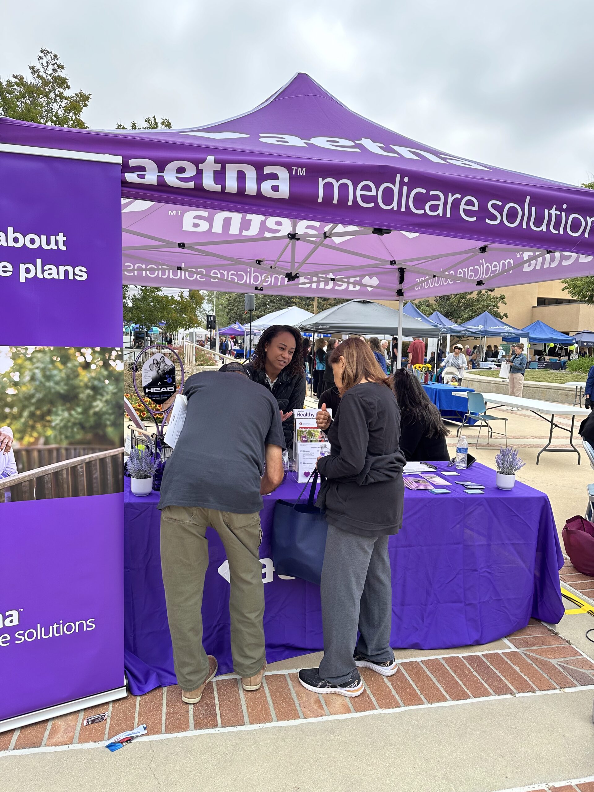 Seniors signing up for a Medicare advantage health plan with the help of Infinity Health Consultancy Agency