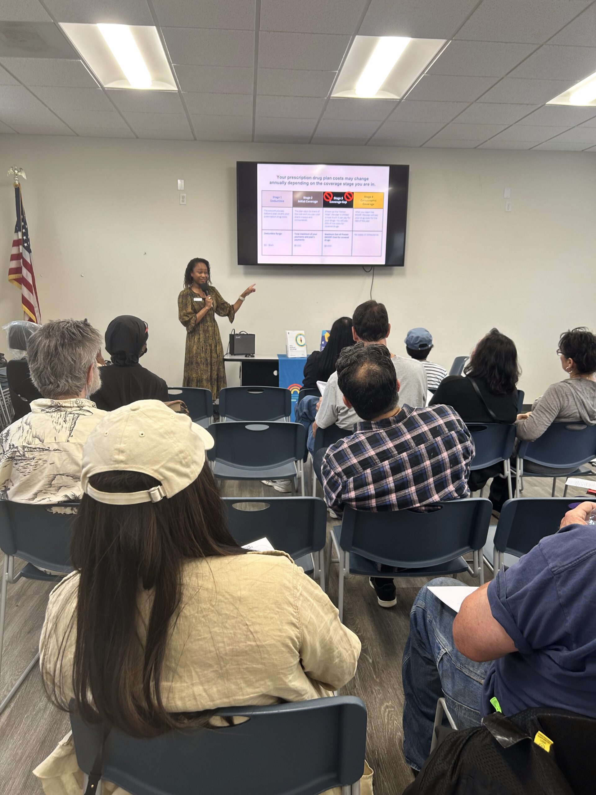 Group of people listening to a Medicare 101 event hosted by Infinity Health Consultancy Agency