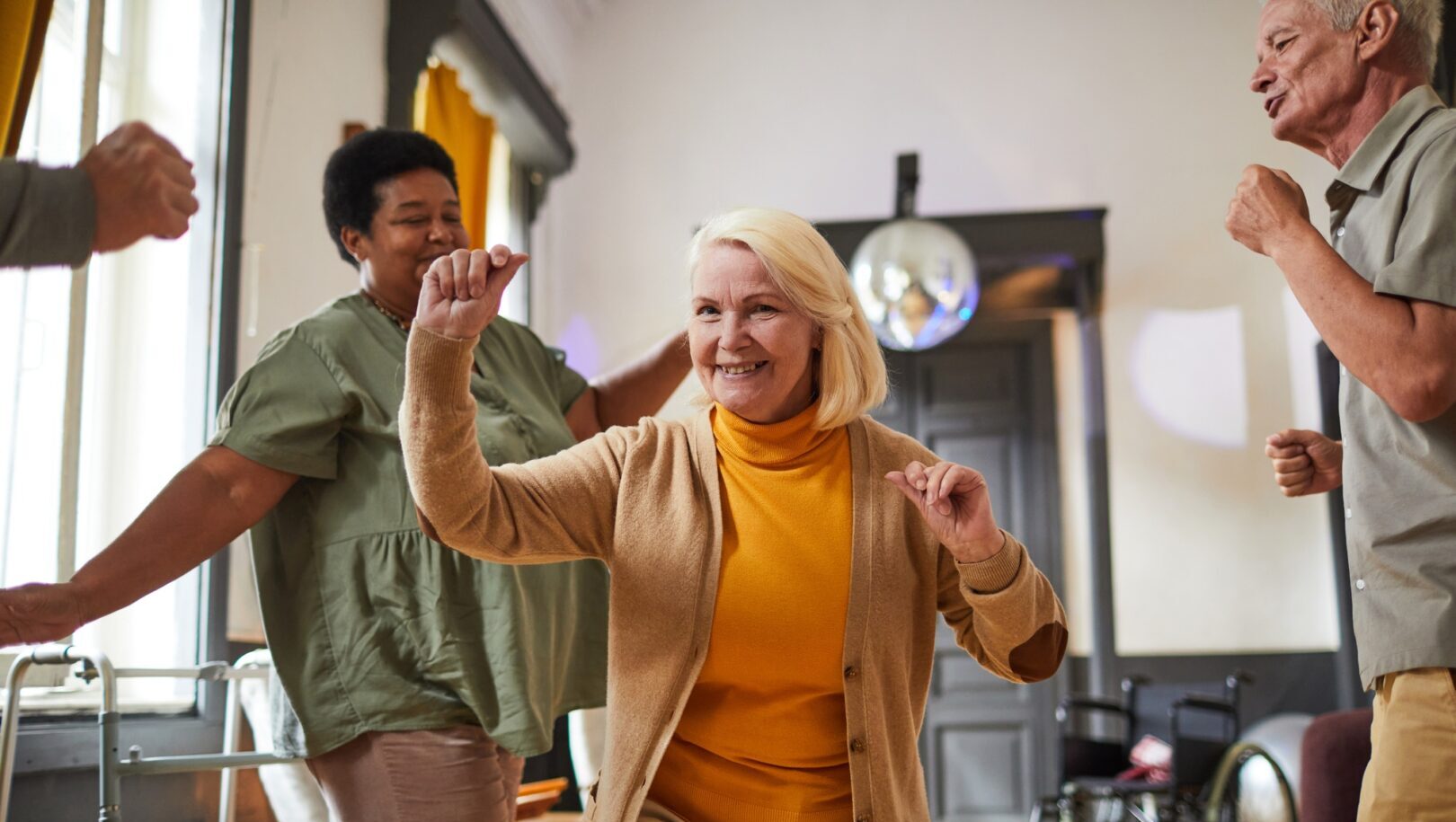 Happy Seniors Dancing after a successful Medicare advantage enrollment